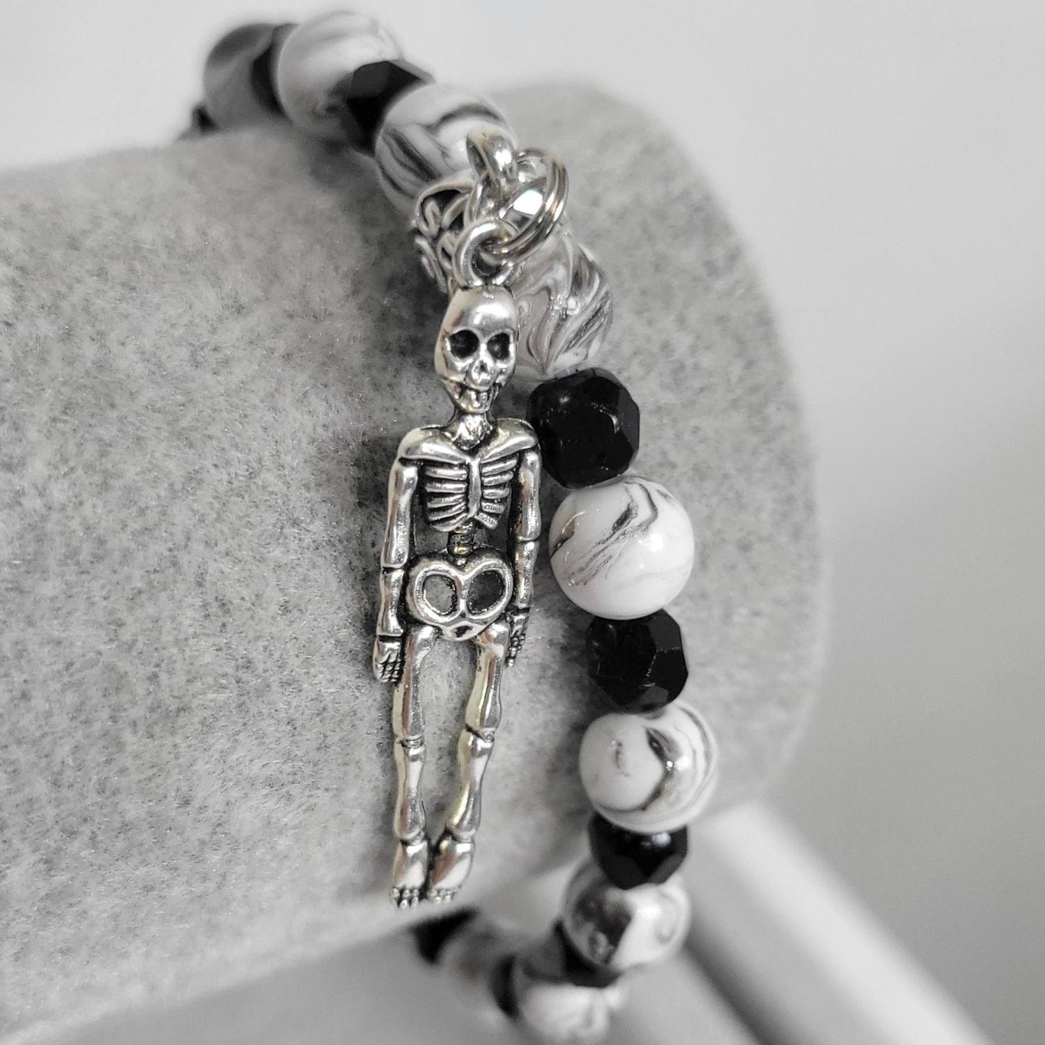 Hand crafted black & white crackle beaded skeleton charm bracelet